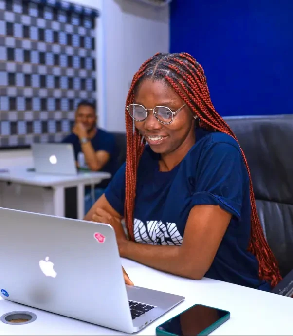 Decagon student working at a laptop